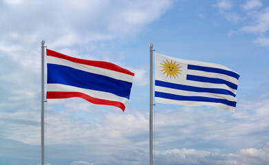 Uruguay and Thailand flags, country relationship concept