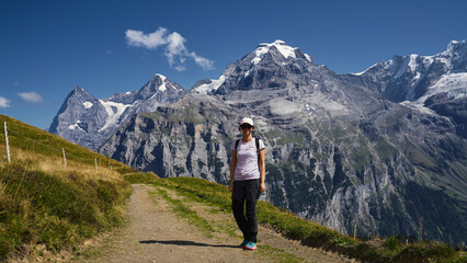 Woman hiking in the Swiss Alps