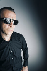 Obraz premium Fashion photo man in shirt sunglasses