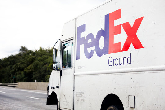 Chicago, IL, USA, October, 28, 2023, FedEx parcel with logo symbolizing fast global communication and efficient mailing services