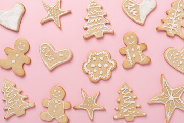 Cute homemade Christmas cookies on color background,top view