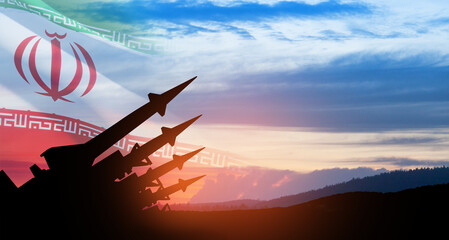 The missiles are aimed at the sky at sunset with Iran flag. Bomb, chemical weapons, missile defense.