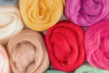 Wool fiber, merino wool of different colors bright colorful for yes handmade, knitting weaving and...