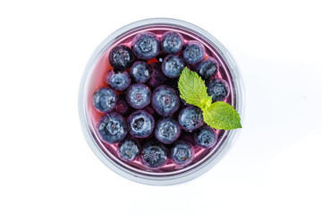 panna cotta with black currants on a white background for a food delivery site 2