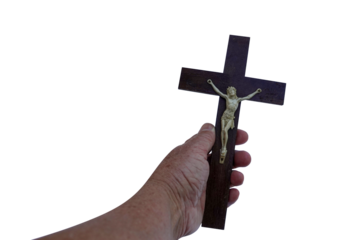 hand with a wooden cross with crucified Jesus Christ