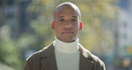 Hispanic Latino man serious face portrait on city street