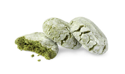 Tasty whole and broken matcha cookies on white background