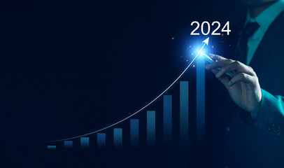 Business growth 2024 concept. Businessman analyze new year trend of future business technology, economic, marketing, opportunity investment, financial, calendar plan, business goal and success.