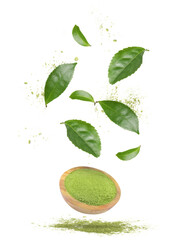 Green matcha powder and leaves falling on white background