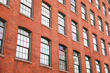 urban commerce, this vibrant stock image captures the essence of thriving commercial real estate through a striking portrayal of brick buildings