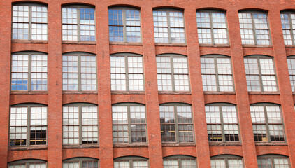 urban commerce, this vibrant stock image captures the essence of thriving commercial real estate through a striking portrayal of brick buildings