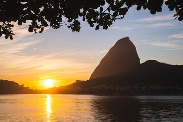 Morning sunrise silhouette of Sugarloaf Mountain Pao de Acucar and Guanabara Bay in Rio de Janeiro,...