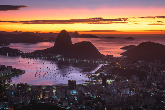 Rio de Janeiro just before Sunrise, City Lights, Sugarloaf Mountain Pao de Acucar and Guanabara Bay, Brazil