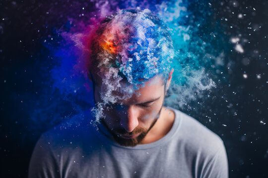 An abstract photo depicts the concept of a man's mental struggle, symbolized by a head covered in icy blue snow. This image conveys the sadness, loneliness and helplessness 