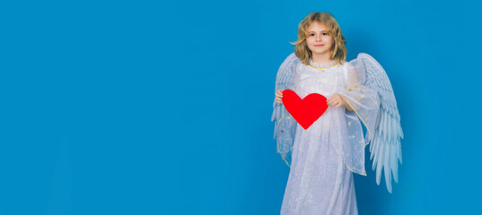 Child with angel wings hold paper heart. Symbol love and valentines day. Banner for website header...