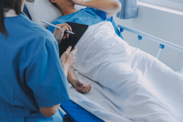 Women Asian doctors hold the patient hand and encourage and provide medical advice While checking the patient health in bed. Concept of Care and compassion, antenatal care, Threatened abortion