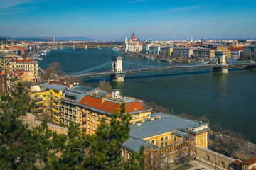 Fototapeta na wymiar Chain bridge and beautiful buildings on the waterfront, Budapest, Hungary