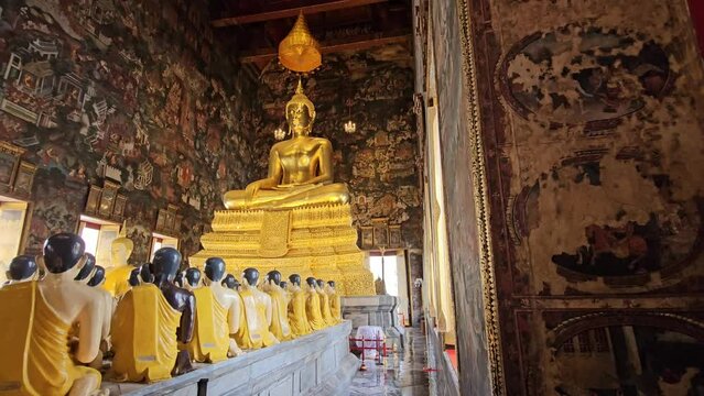 Ancient Golden Buddha Image at Wat Suthat Thepwararam Ratchaworamahawihan Temple, Bangkok Thailand.