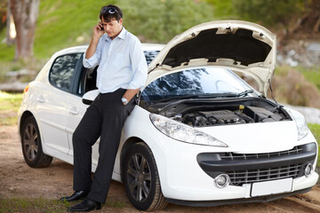 Car breakdown, phone call and business man in conversation for help, service or travel. Smartphone, roadside assistance and serious person with engine fail, transport insurance and emergency support