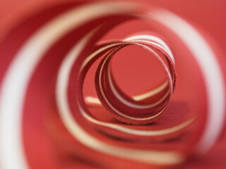 Background in the colors of Latvia. Red white red ribbon in the colors of the Latvian national flag. A whirlwind of festive events