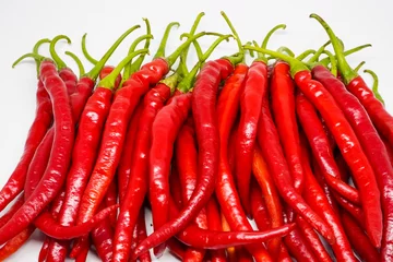 Fotobehang Red Chili Curly is one of the most widely grown and sold red chili varieties in Indonesia. Ingredient, including making chili sauce. Chili peppers (also chile, chile pepper, chilli pepper, or chilli). © Faris Fitrianto
