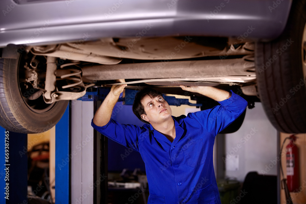 Wall mural car, inspection or repair with a mechanic man in a garage for a report on a vehicle service for insu