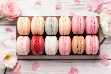 an image of colorful macarons in wooden boxes on white table