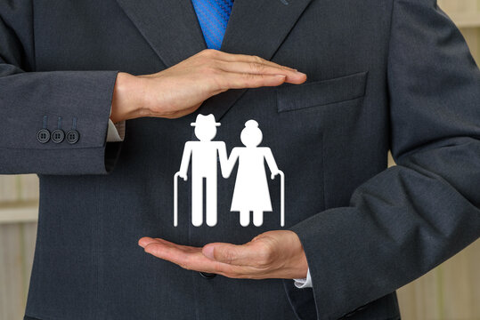 Pension insurance for retirees and social security tax, financial concept : Retired senior couple standing together, find security under the protective coverage of their trusted insurance provider.