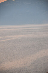 the sea at sunrise. A warm summer morning in the countryside overlooking the sea.