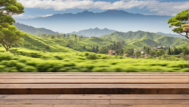 close up empty wooden desk with blurred background of tea garden on the mountain