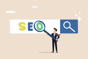 SEO, Search Engine Optimization for websites to be featured in search results page concept, professional businessman holding analytical magnifying glass on the word SEO.