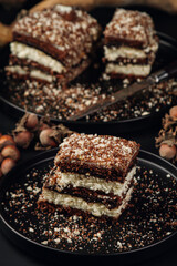 Slice of homemade cake on a black plate