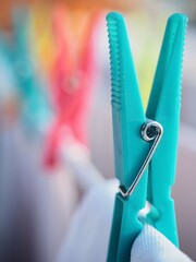 drying Laundry and closeup of a blue clothes peg 