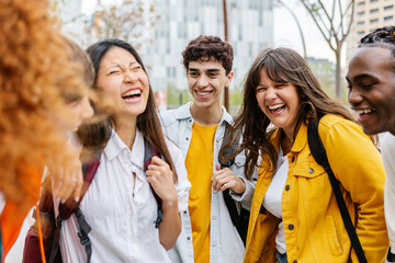 High school students group having fun outdoor after class. Diverse young people laughing standing together at college campus. Youth, education and academic community concept. - obrazy, fototapety, plakaty