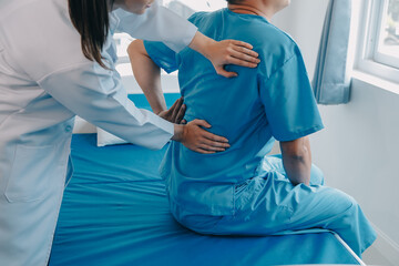 Patient doing some special exercises under supervision in a room.