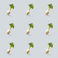 Organic natural Daikon vegetable seamless photo pattern on a solid color background