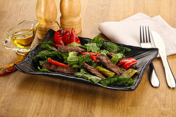 Salad with grilled beef steak
