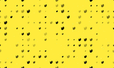 Seamless background pattern of evenly spaced black hands of different sizes and opacity. Vector illustration on yellow background with stars