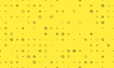 Seamless background pattern of evenly spaced black time back symbols of different sizes and opacity. Vector illustration on yellow background with stars