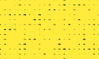 Seamless background pattern of evenly spaced black playing cards symbols of different sizes and opacity. Vector illustration on yellow background with stars