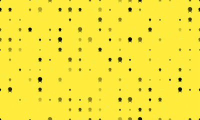 Seamless background pattern of evenly spaced black spirit ball symbols of different sizes and opacity. Vector illustration on yellow background with stars