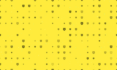 Seamless background pattern of evenly spaced black tiger head symbols of different sizes and opacity. Vector illustration on yellow background with stars