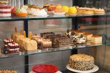 Showcase with different tasty desserts in store
