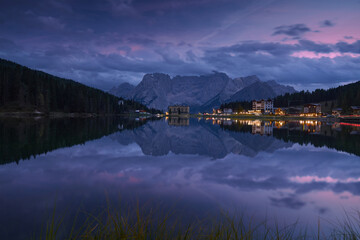 Panoramic view of Lago di Misurina in the evening after sunset. Blue hour in the Dolomites, Italy.