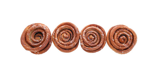 Tasty cinnamon rolls isolated on white, top view