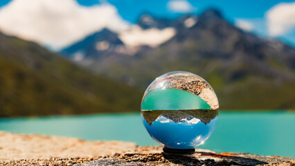 Crystal ball alpine landscape shot at Sylvretta reservoir, Sylvretta-High-Alps-Street, Vorarlberg,...
