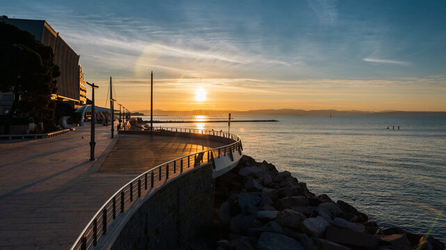 Grado promenade Walk path on the Dam at Sunrise in the Morning - Friuli Venezia Giulia Italy