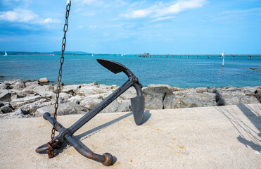 An iron anchor with a chain on the shore of Lake Constance - Bodensee - in swiss Altnau © Taljat
