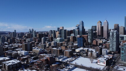 A drone flight between Calgary skyscrapers in winter	
