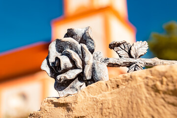 Details of a stone rose with a church at Thuernthenning, Dingolfing-Landau, Bavaria, Germany